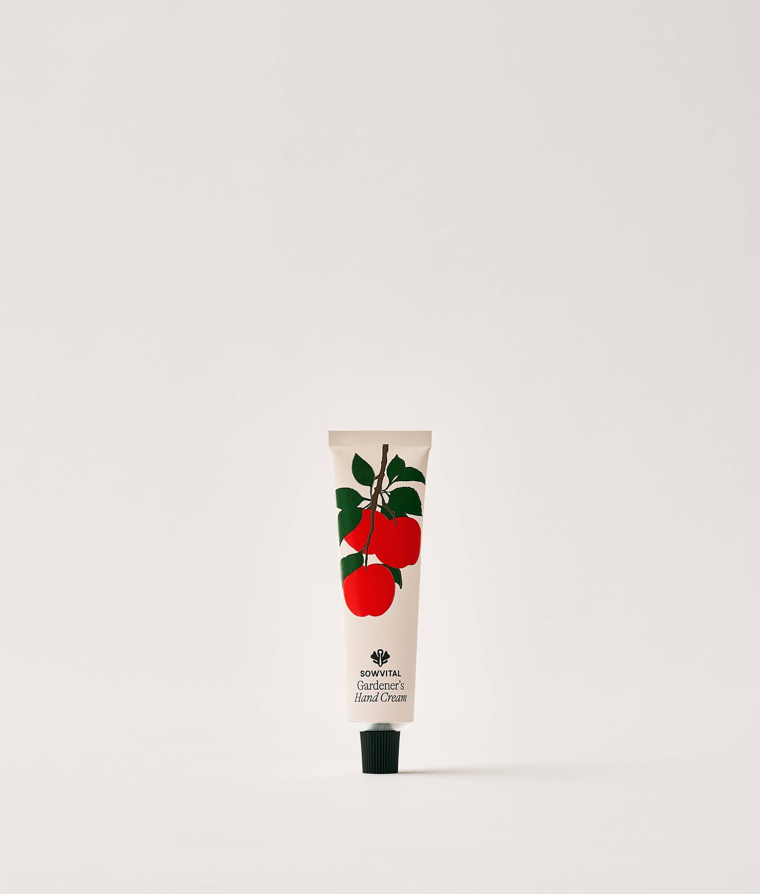 Hand cream tube with apple design on a white background