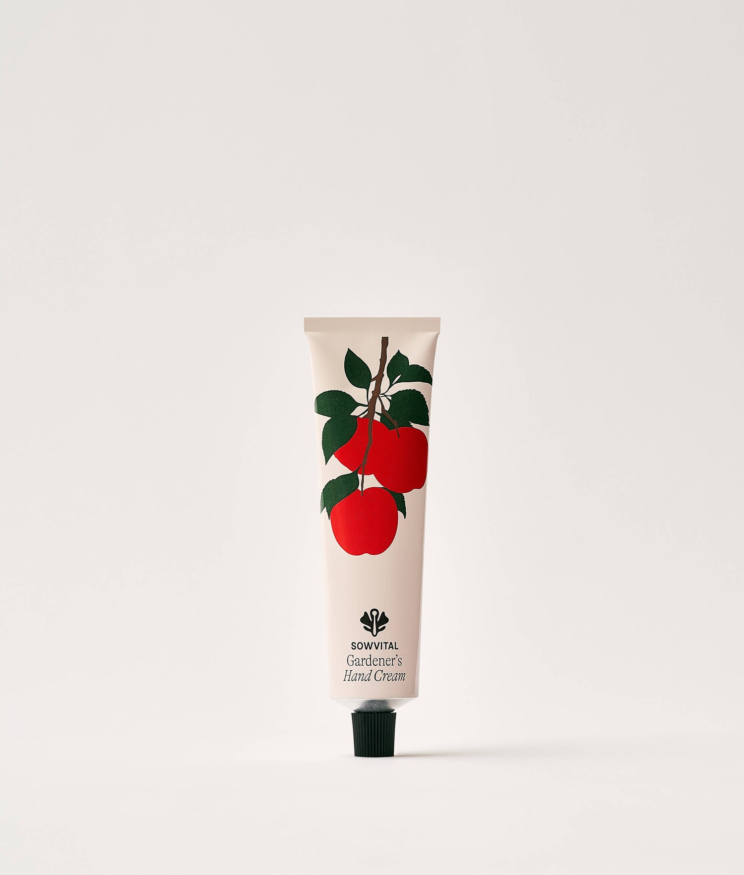Hand cream tube with apple design on a white background