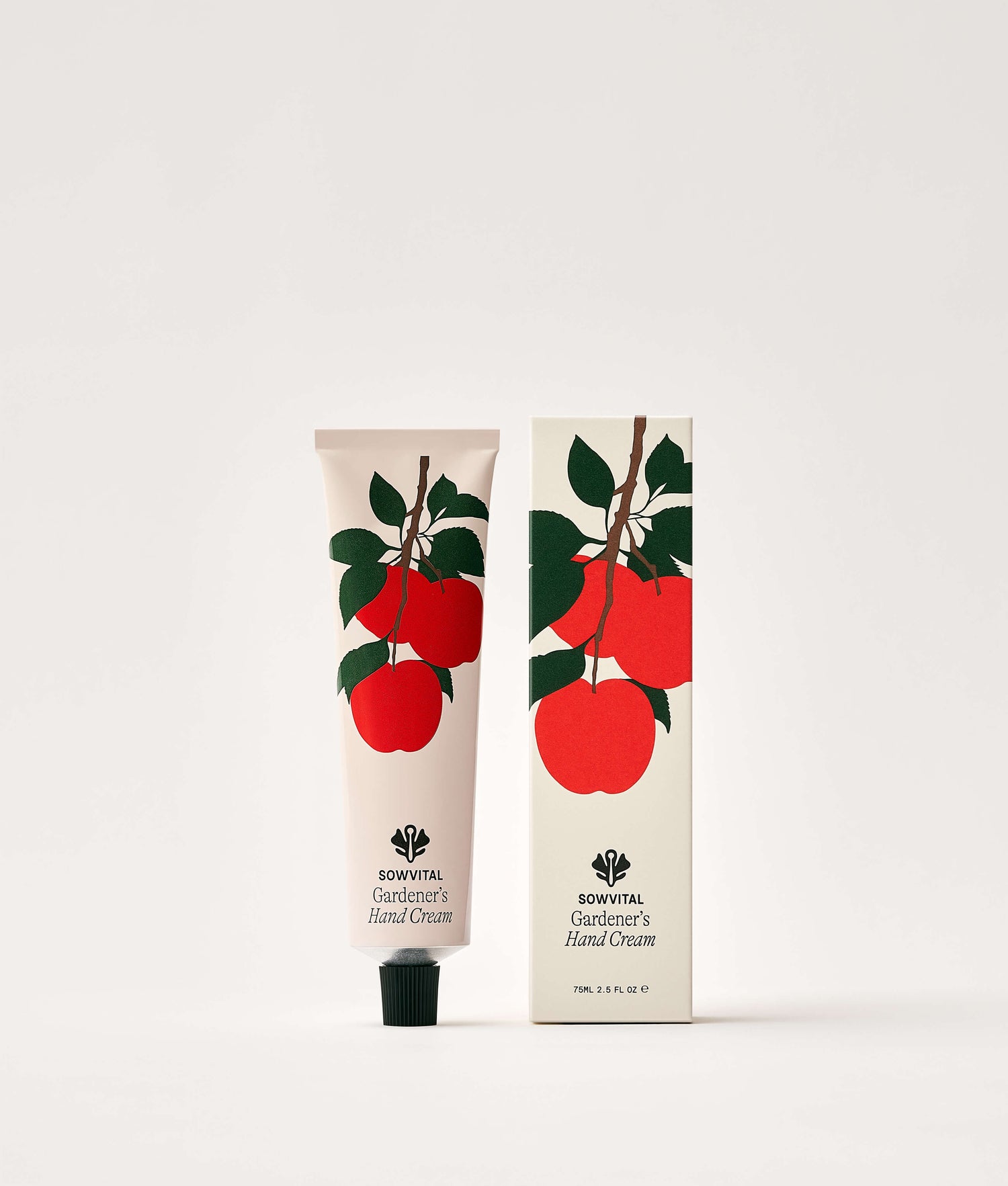 Hand cream with packaging featuring red apples on a white background
