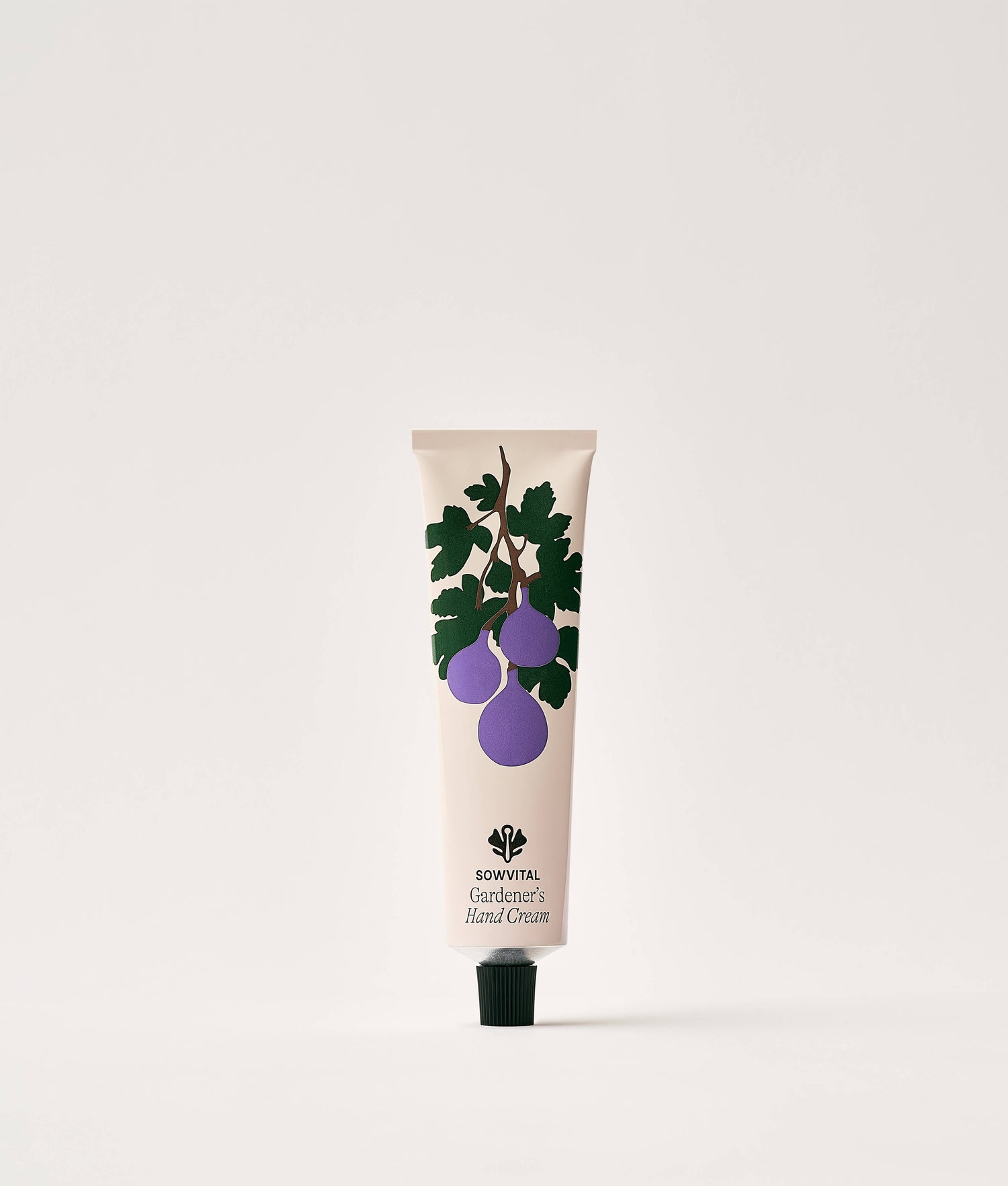 Hand cream tube with fig design on a white background