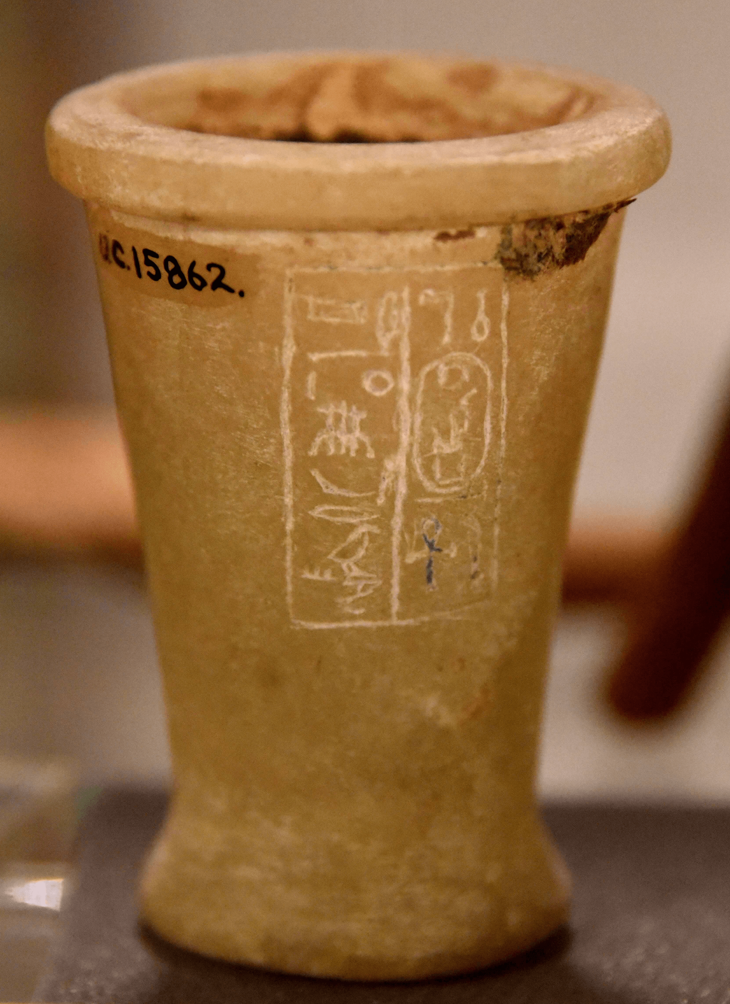 Jar bearing the cartouche of Hatshepsut. Filled in with cedar resin. Calcite, unfinished. Foundation deposit. 18th Dynasty, from Deir el-Bahari, Egypt. Petrie Museum of Egyptian Archaeology, London.