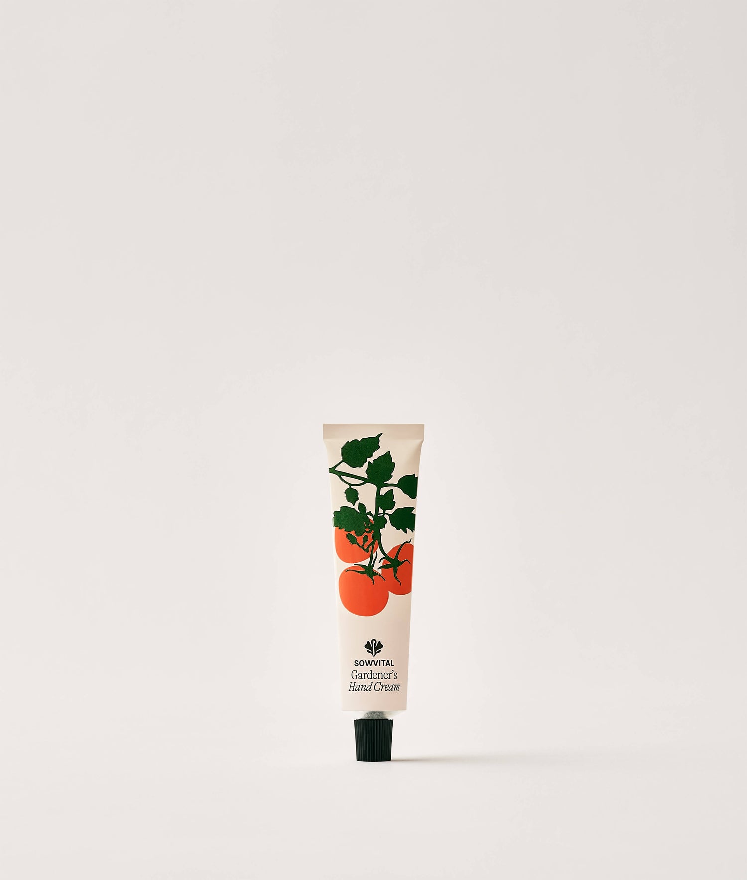 Hand cream tube with tomato design on a white background