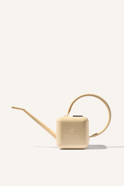 A beige stainless steel 1.25 litre watering can, embossed with the Sowvital logos.