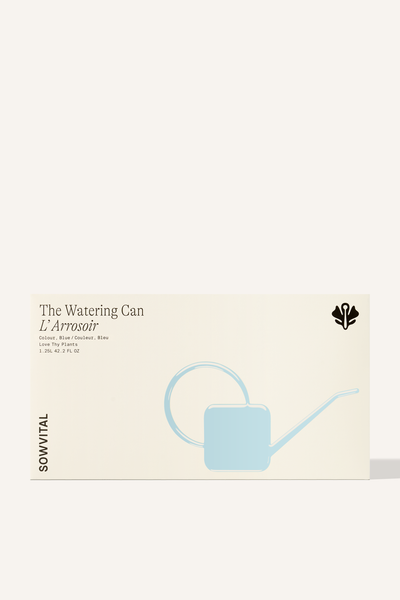 A wide rectangular box with a blue embossed illustration indicating the colour of the watering can contained within.