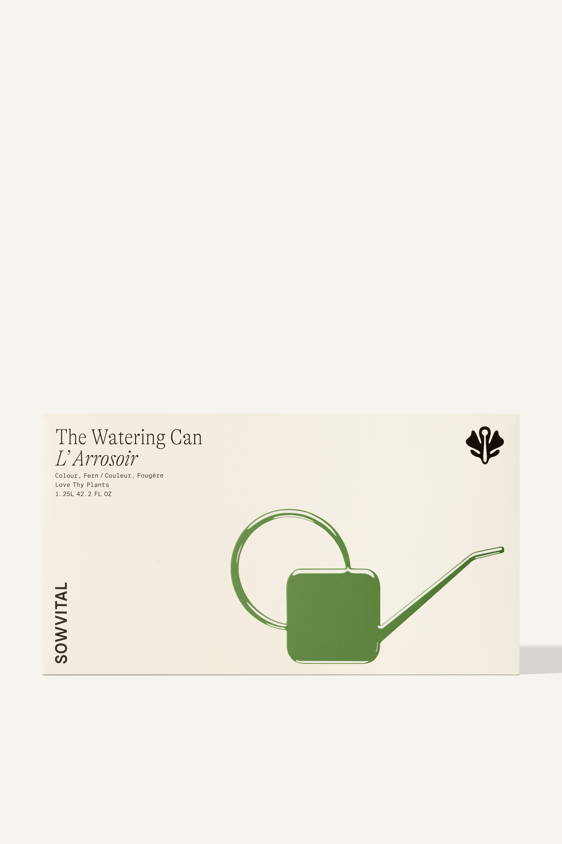 A wide rectangular box with a green embossed illustration of the watering can contained within.