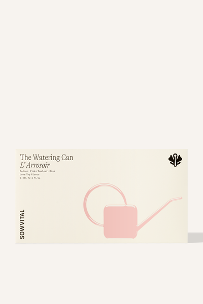 A wide rectangular box, embossed with a pink illustration in the shape of the watering can contained within.