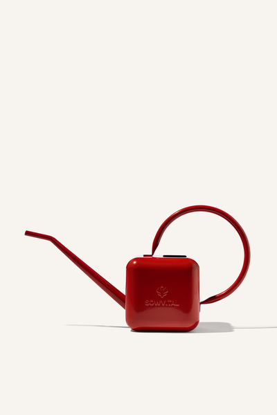 A red stainless steel 1.25 litre watering can, embossed with the Sowvital logos.