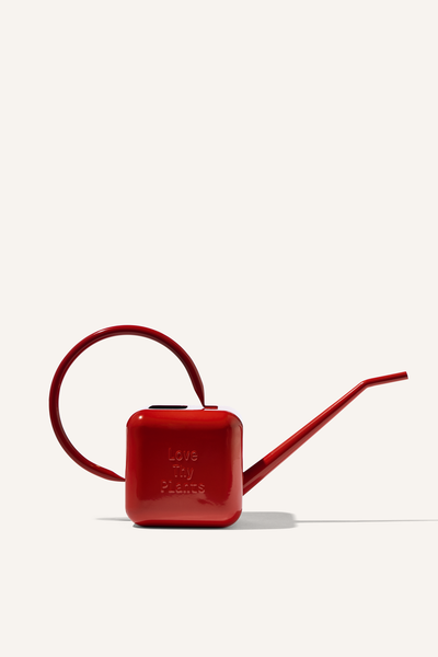 A red stainless steel 1.25 litre watering can, embossed with the phrase "Love Thy Plants".