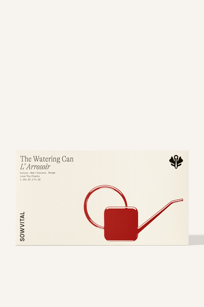 A wide rectangular box with a red embossed illustration of the watering can contained within.