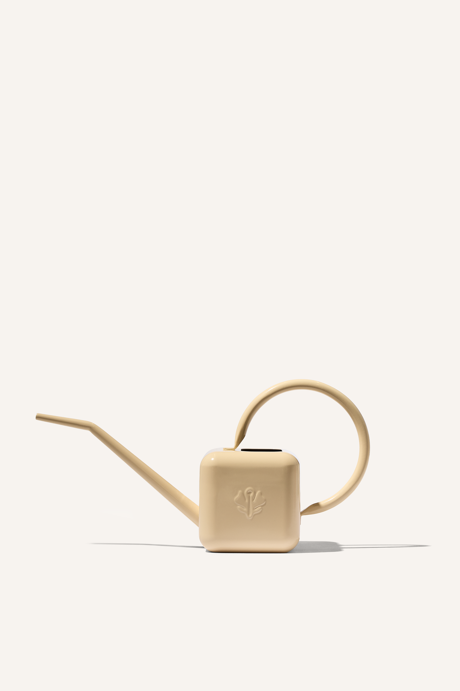 A beige stainless steel 0.5 litre watering can, embossed with the Sowvital logo.