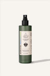 The Sowvital Aqua Leaf Cleanser, a 200ml green glass bottle with a spray top and beige label. The background is beige.