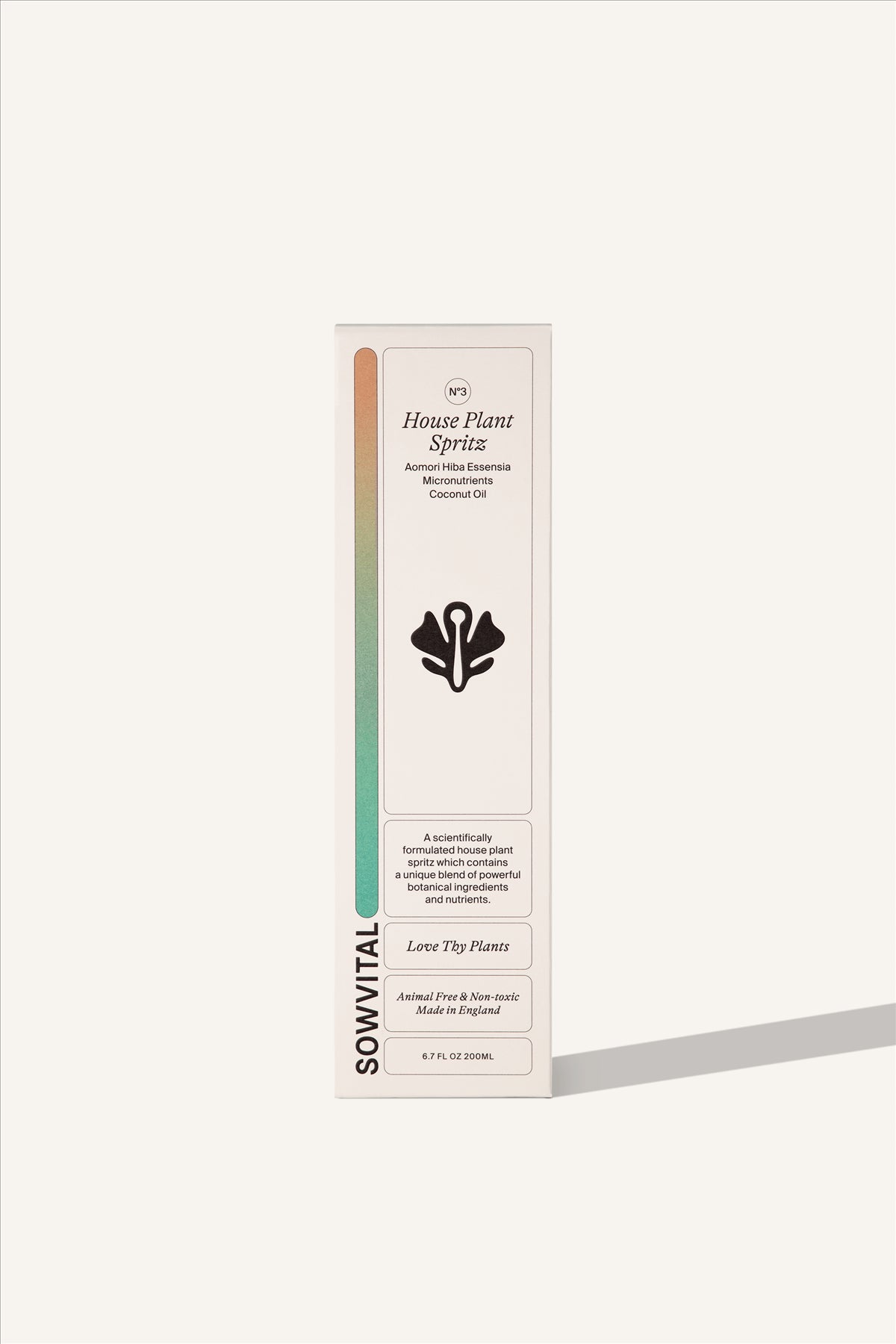 The House Plant Spritz box, a tall, rectangular, beige fedrigoni paper box with the Sowvital logo and a coloured gradient running down the left hand side on the front. The image background is beige.