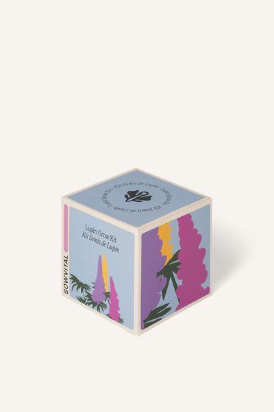 Sowvital's Lupin Seed Grow Kit from a corner angle. A square fedrigoni paper box with a playful illustration of lupin on the front and side. The background is beige.