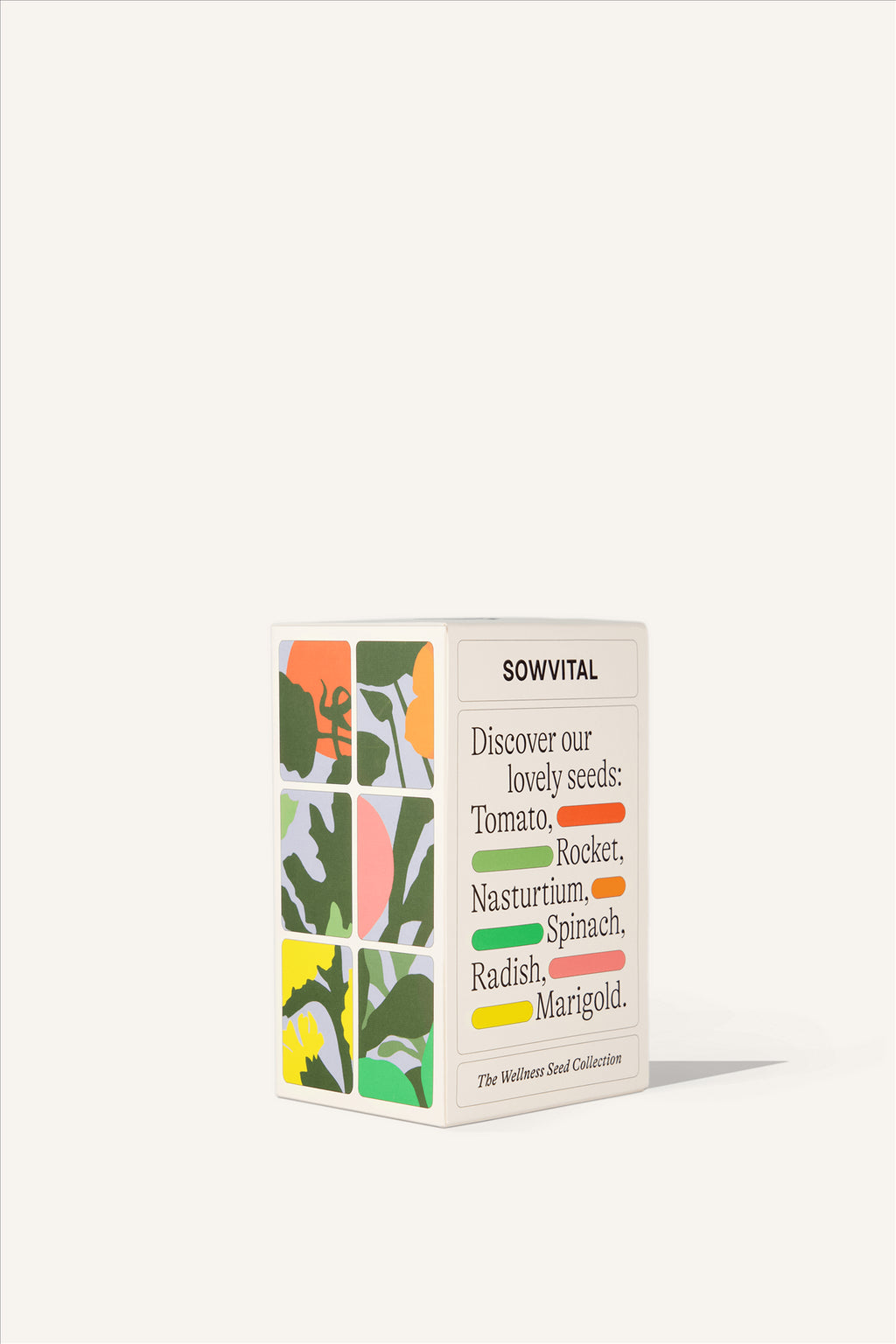 A rectangular beige paper box, illustrated on one side with six different varieties of plant which are described on the other side. Tomatoes, Rocket, Nasturtium, Spinach, Radish, and Marigold.