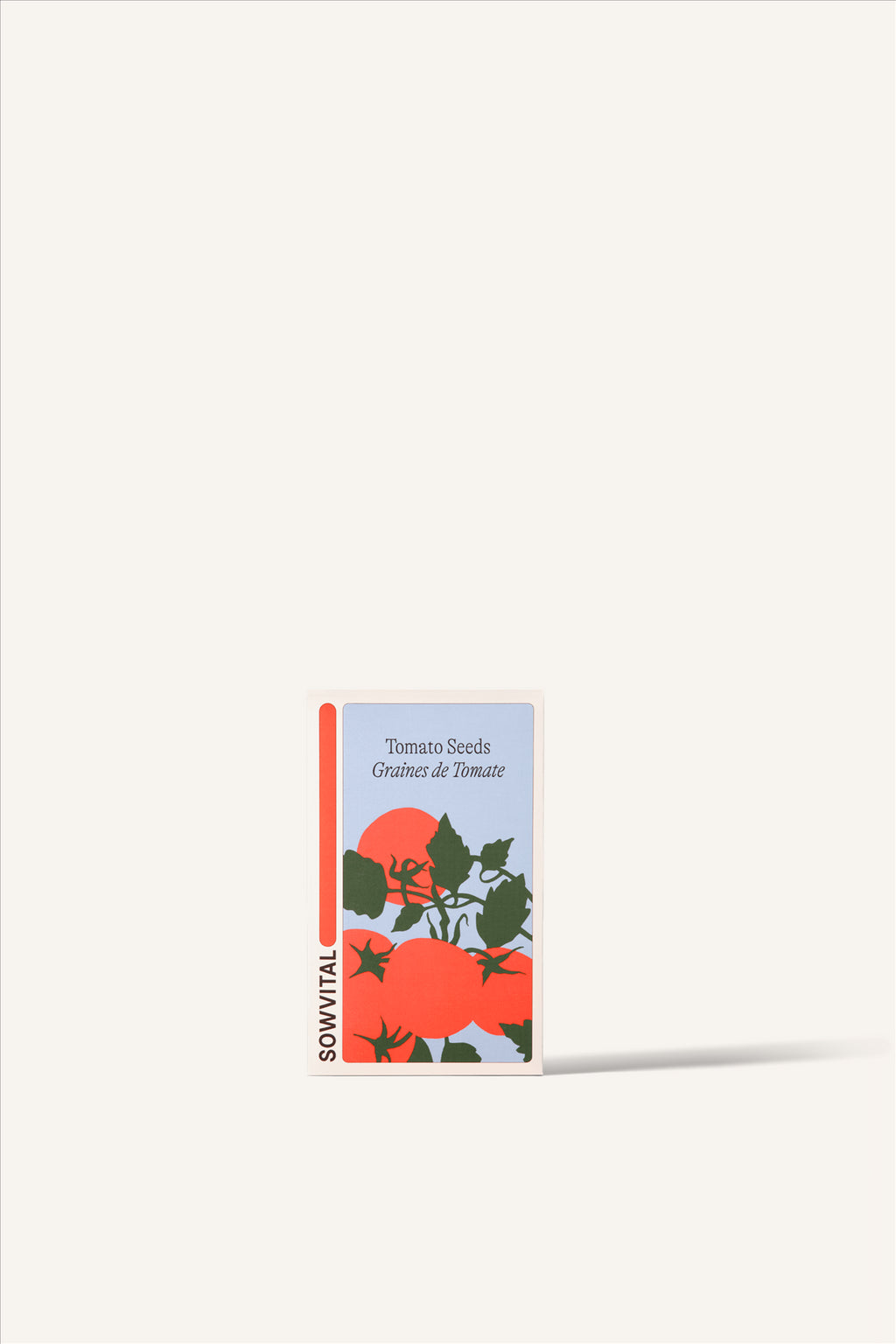 Sowvital's Tomato Seeds. A rectangular fedrigoni paper box with a playful illustration of tomatoes on the front. The background is beige.