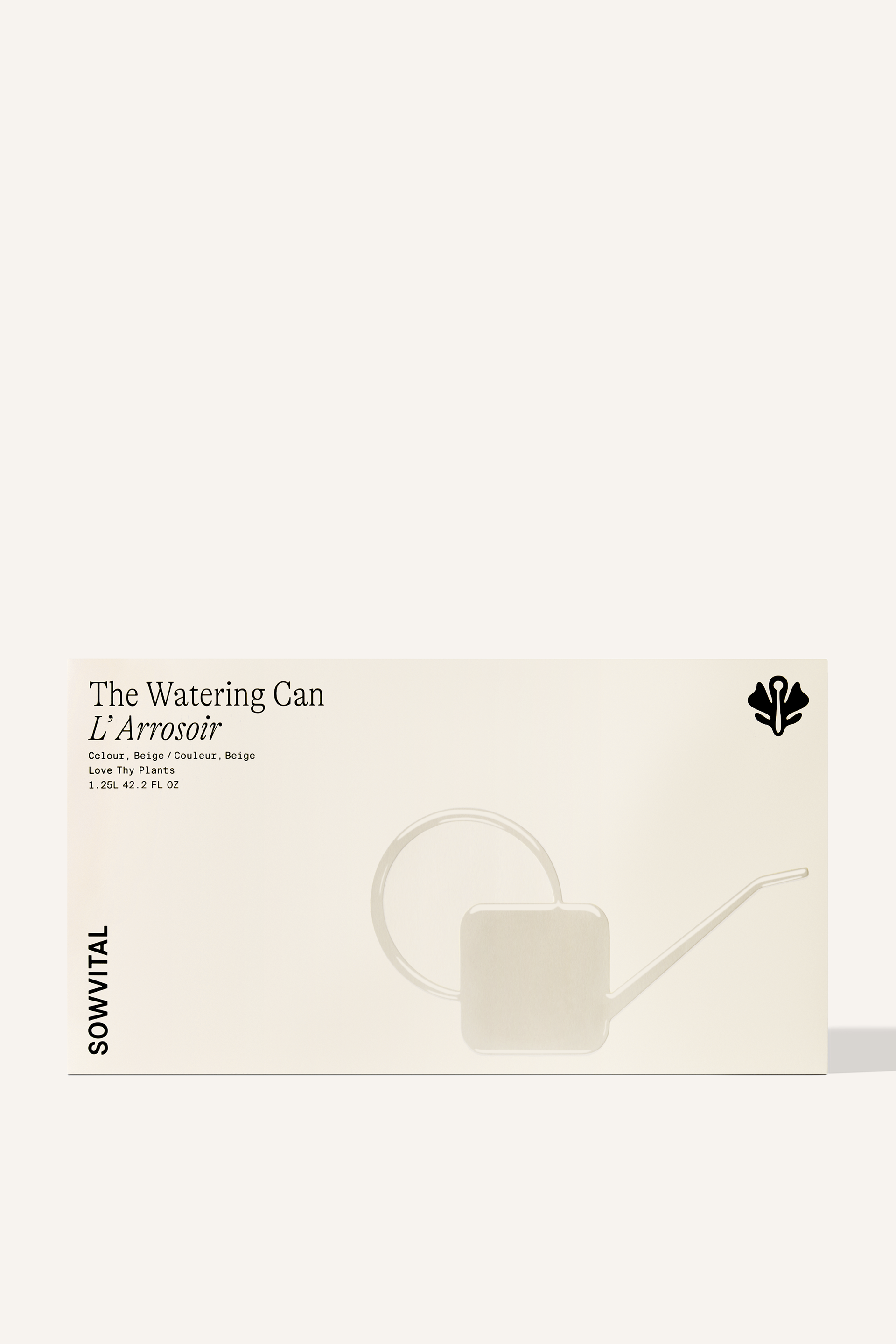 A large rectangular beige paper box, embossed with an illustration of the beige watering can contained inside.