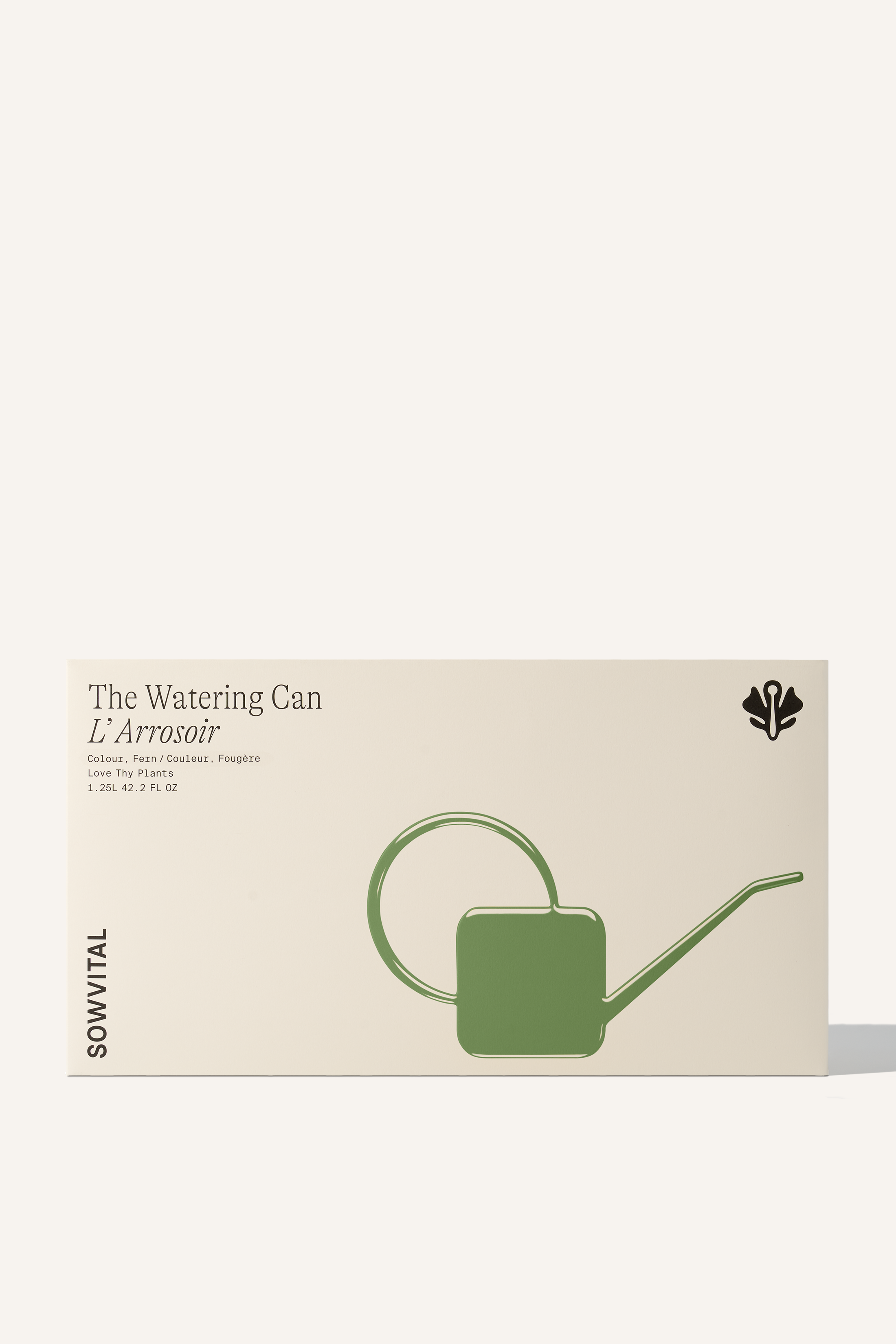 A wide rectangular box with a green embossed illustration of the watering can contained within.