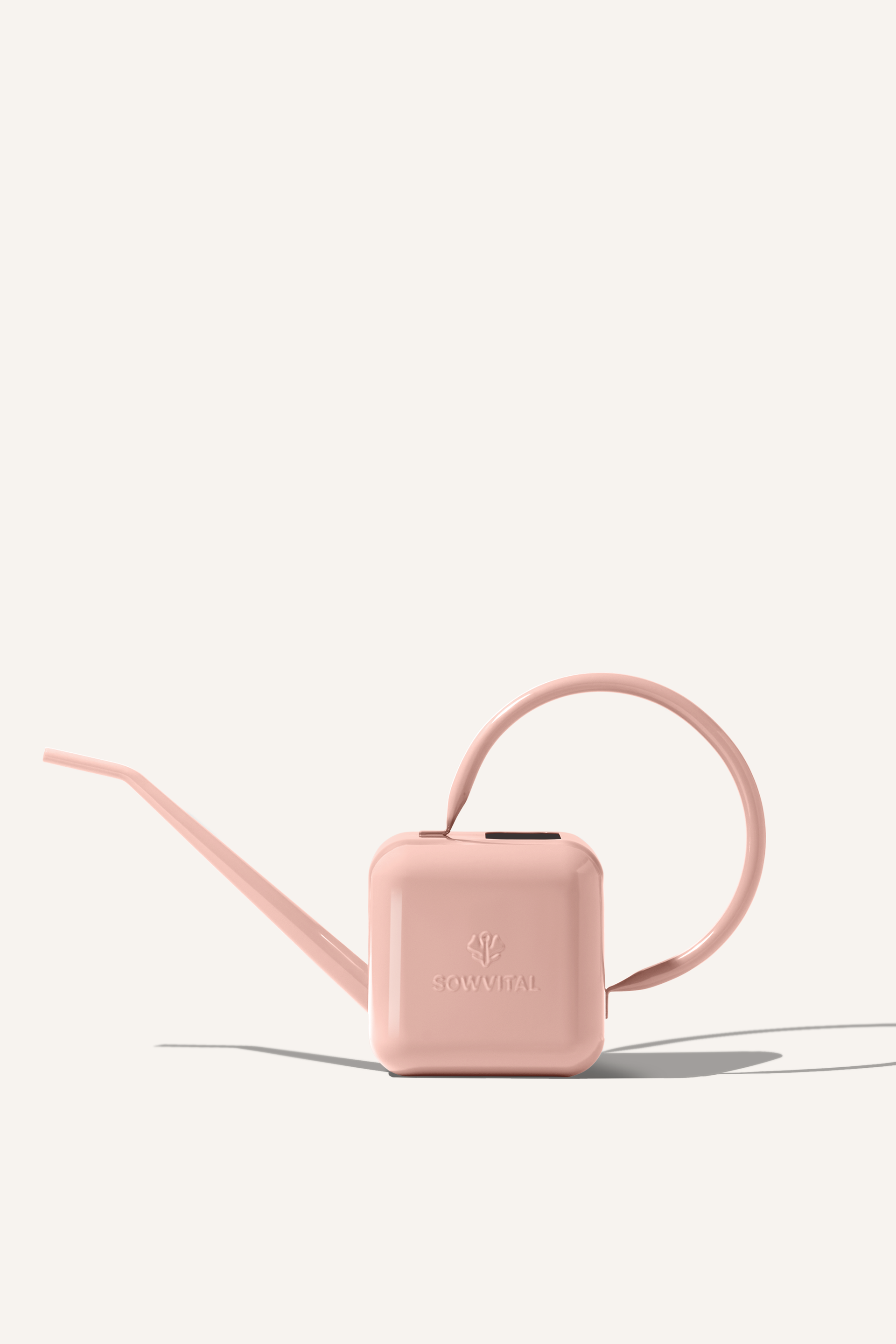 A pink stainless steel 1.25 litre watering can, embossed with the Sowvital logos.