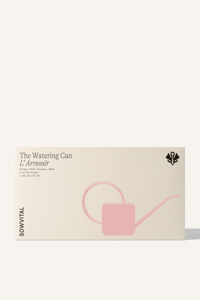 A wide rectangular box, embossed with a pink illustration in the shape of the watering can contained within.