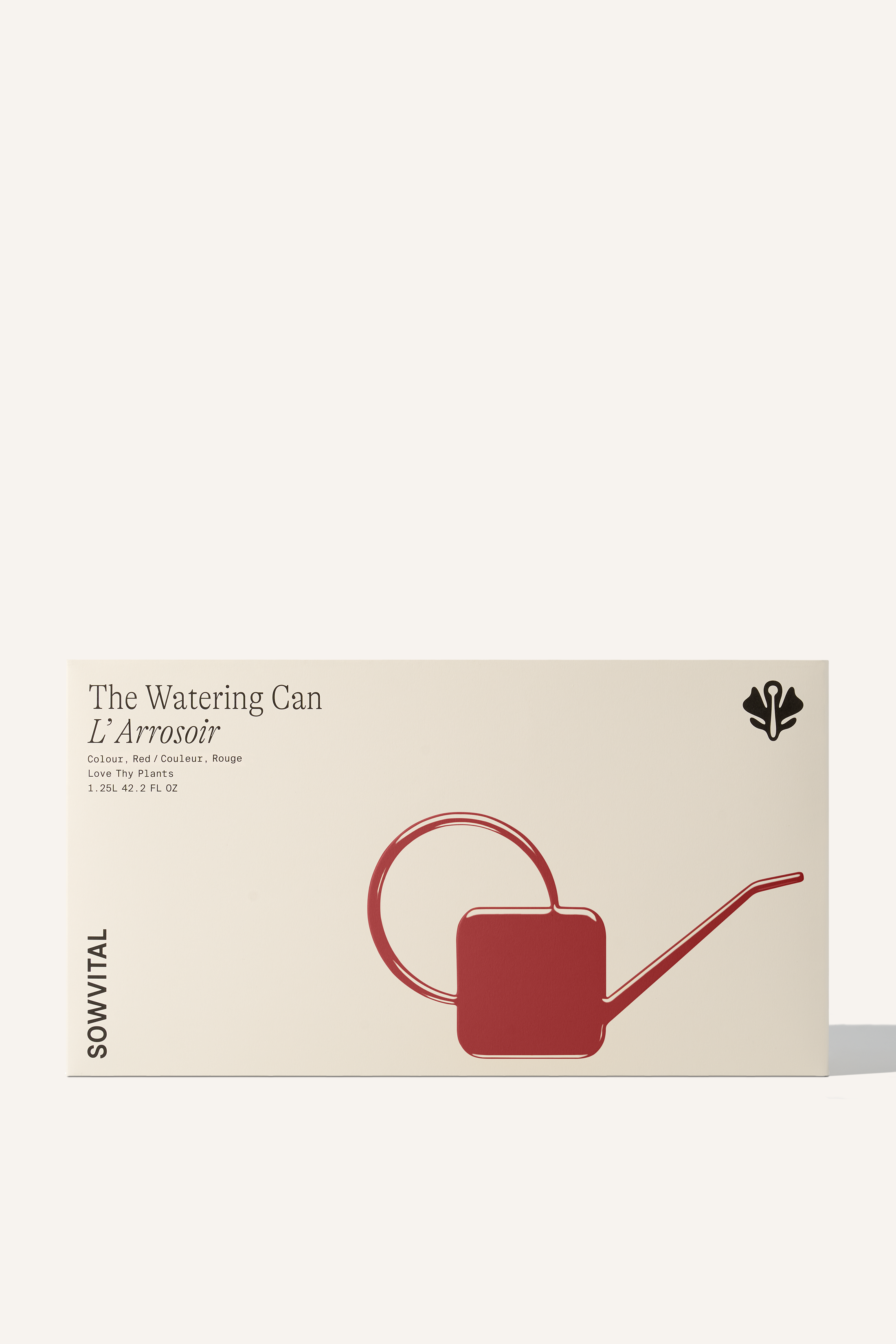 A wide rectangular box with a red embossed illustration of the watering can contained within.