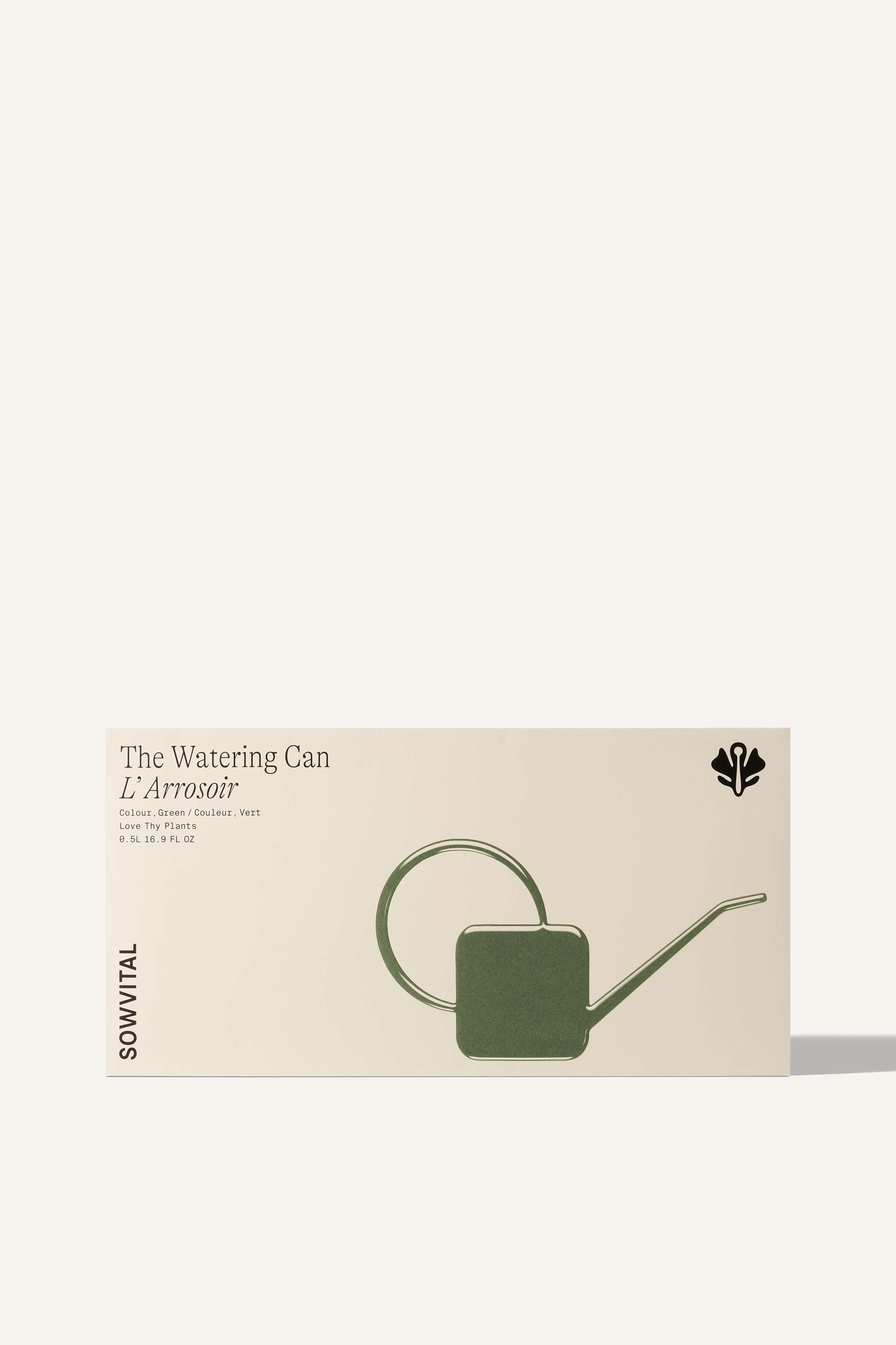 A wide rectangular box with an embossed illustration on the front of a green Sowvital watering can.